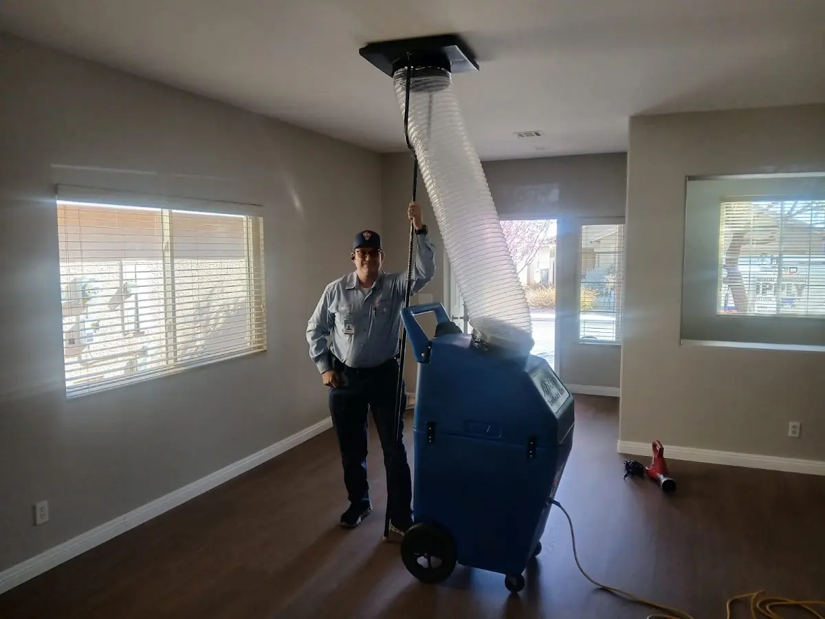Professional Dryer Vent Cleaning work inside a Whitewater home
